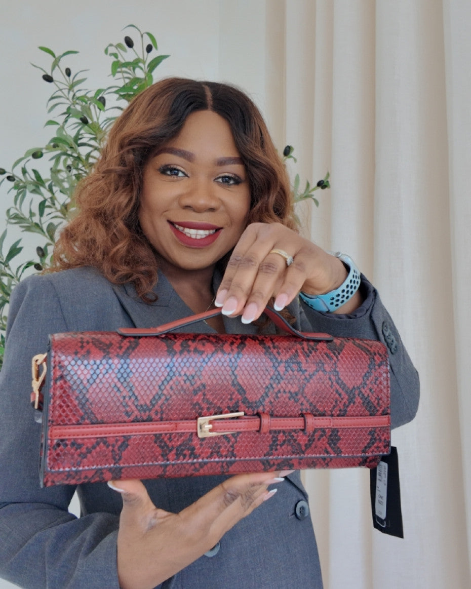 Snake Print Clutch Bag