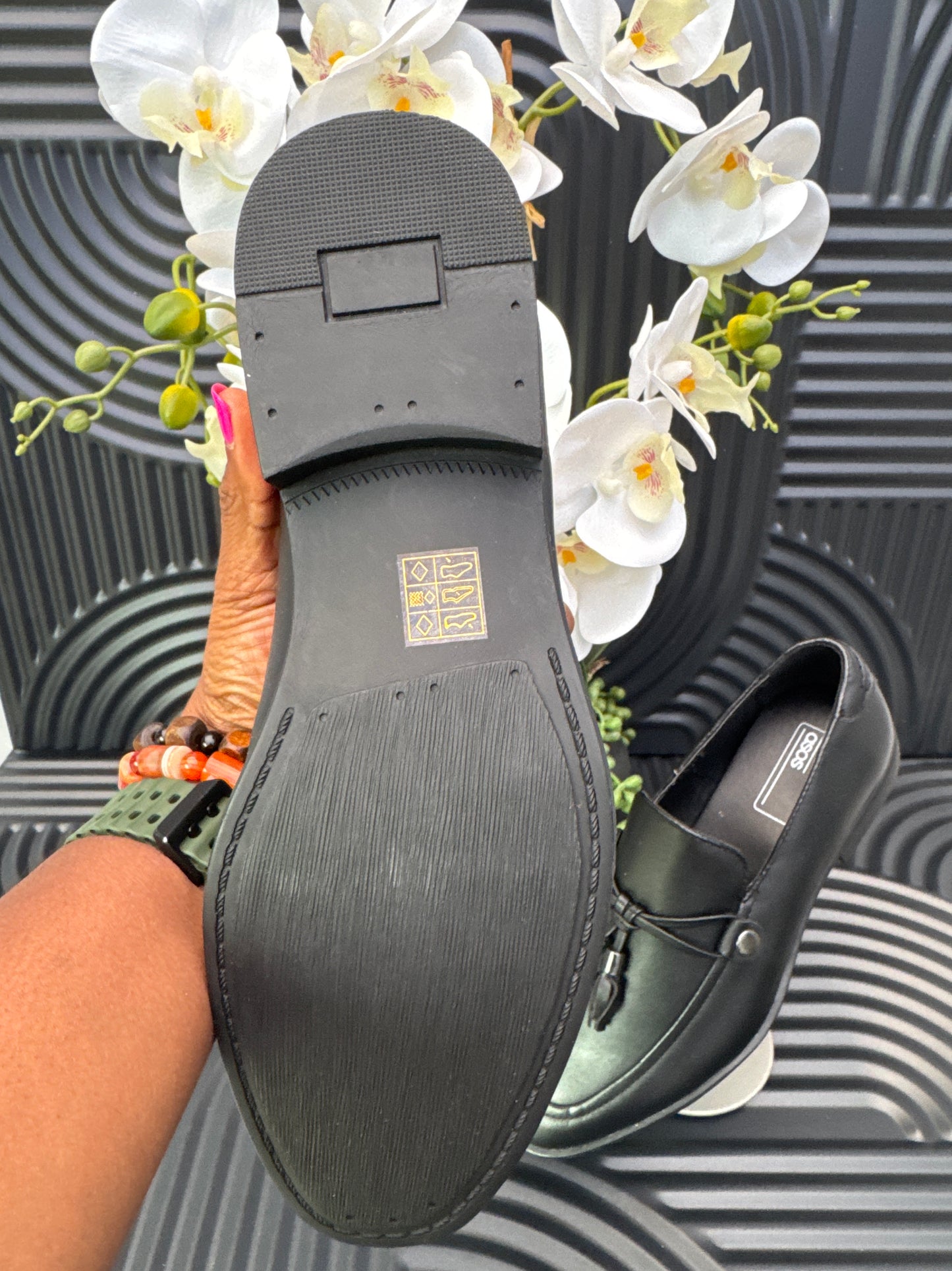 Black Slip on loafers with tassel details