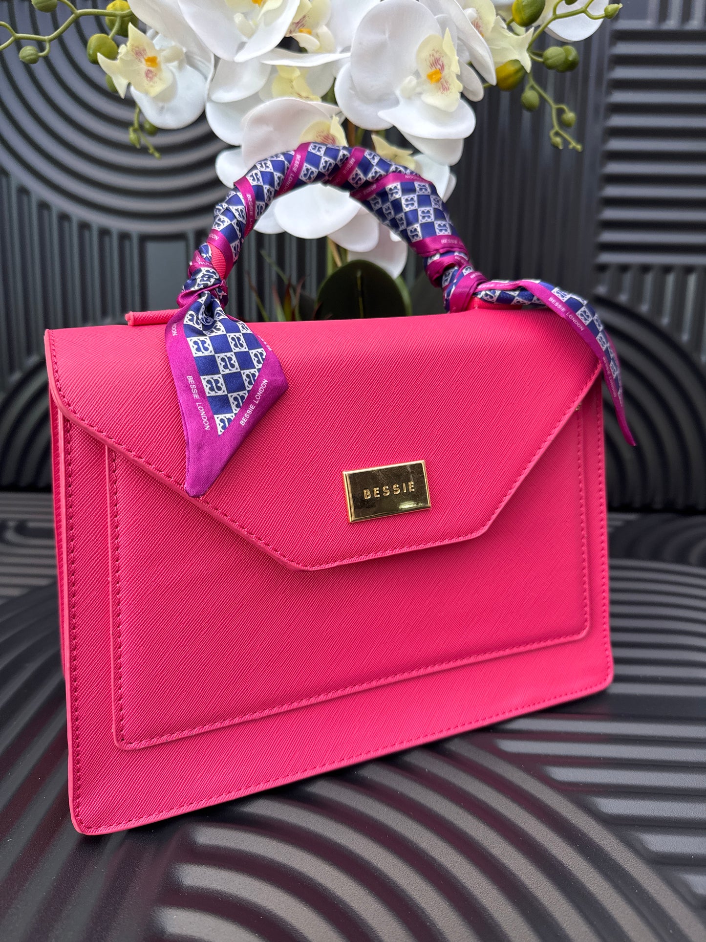 Pink structured bag with scarf detail