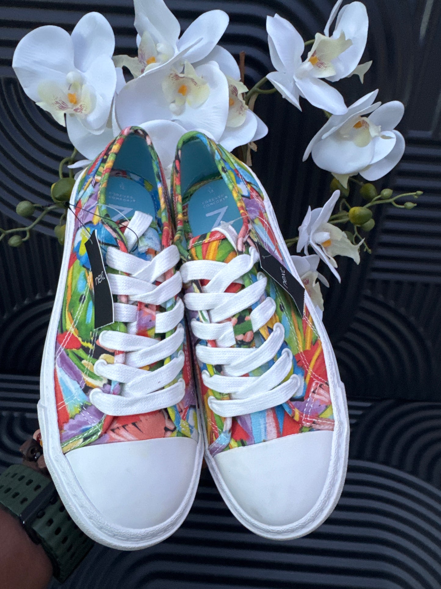 Floral detail lace up trainers