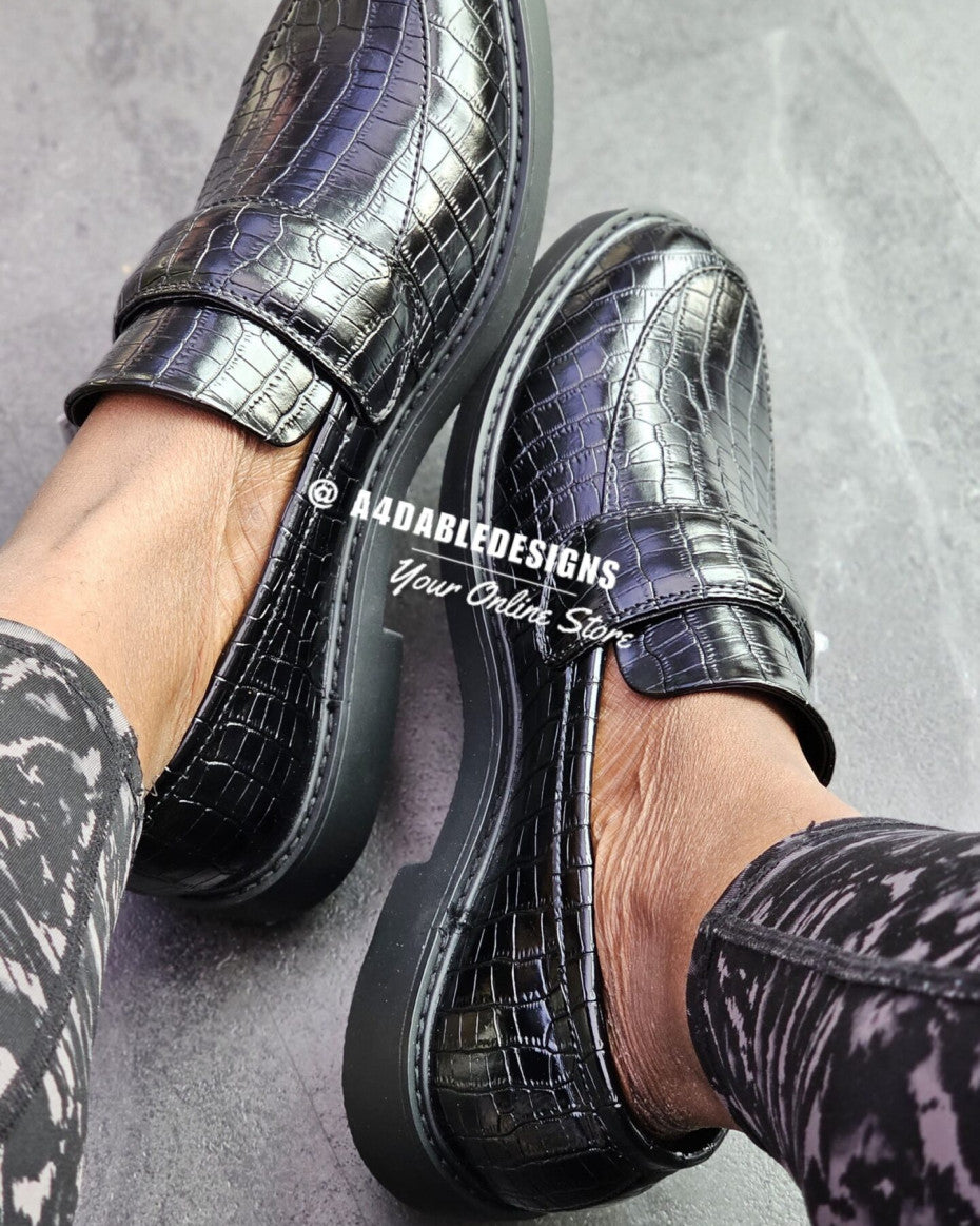 Croc effect loafers