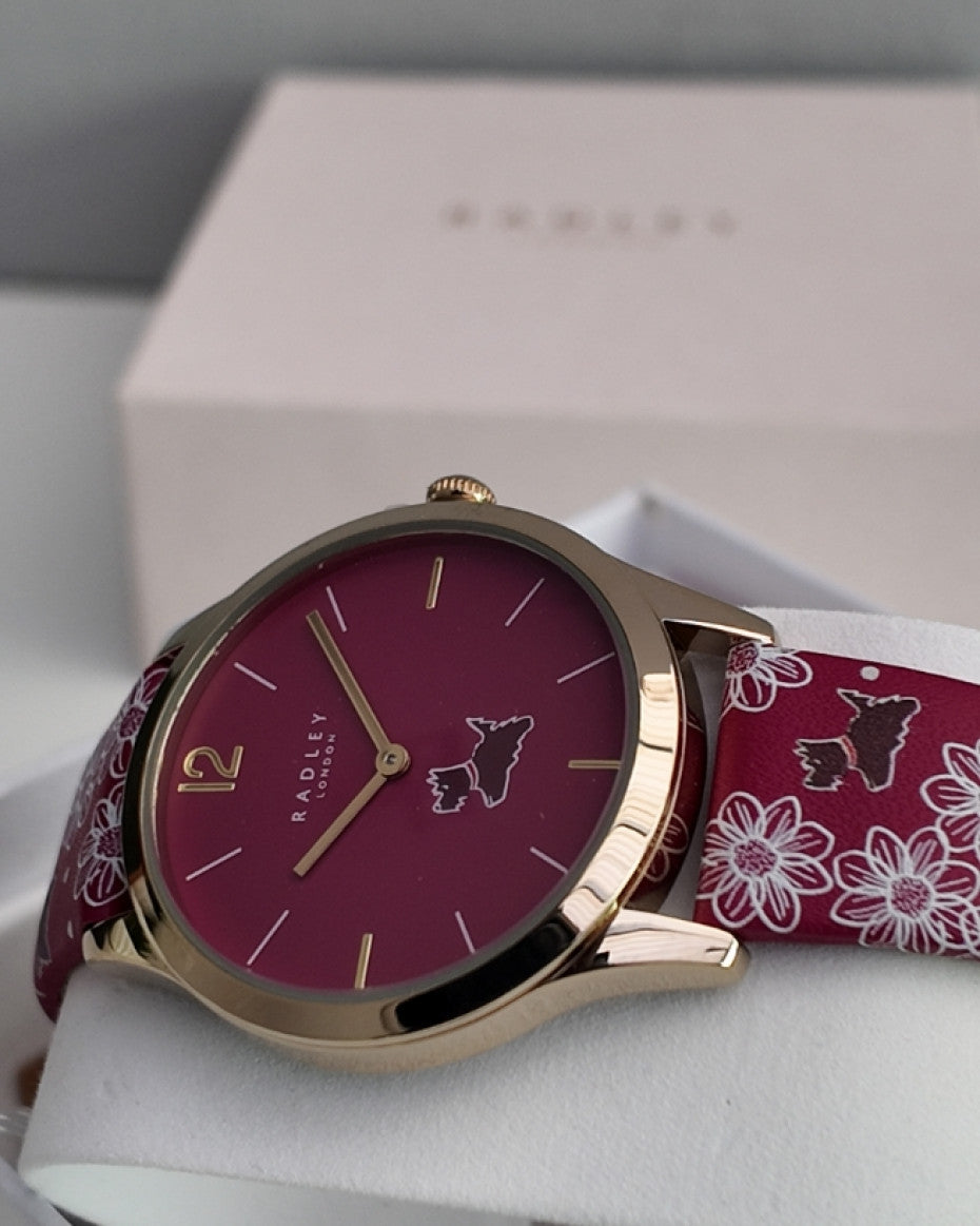 RADLEY Ladies Gold Plated Dark Rose Printed Strap Watch and Earring Set