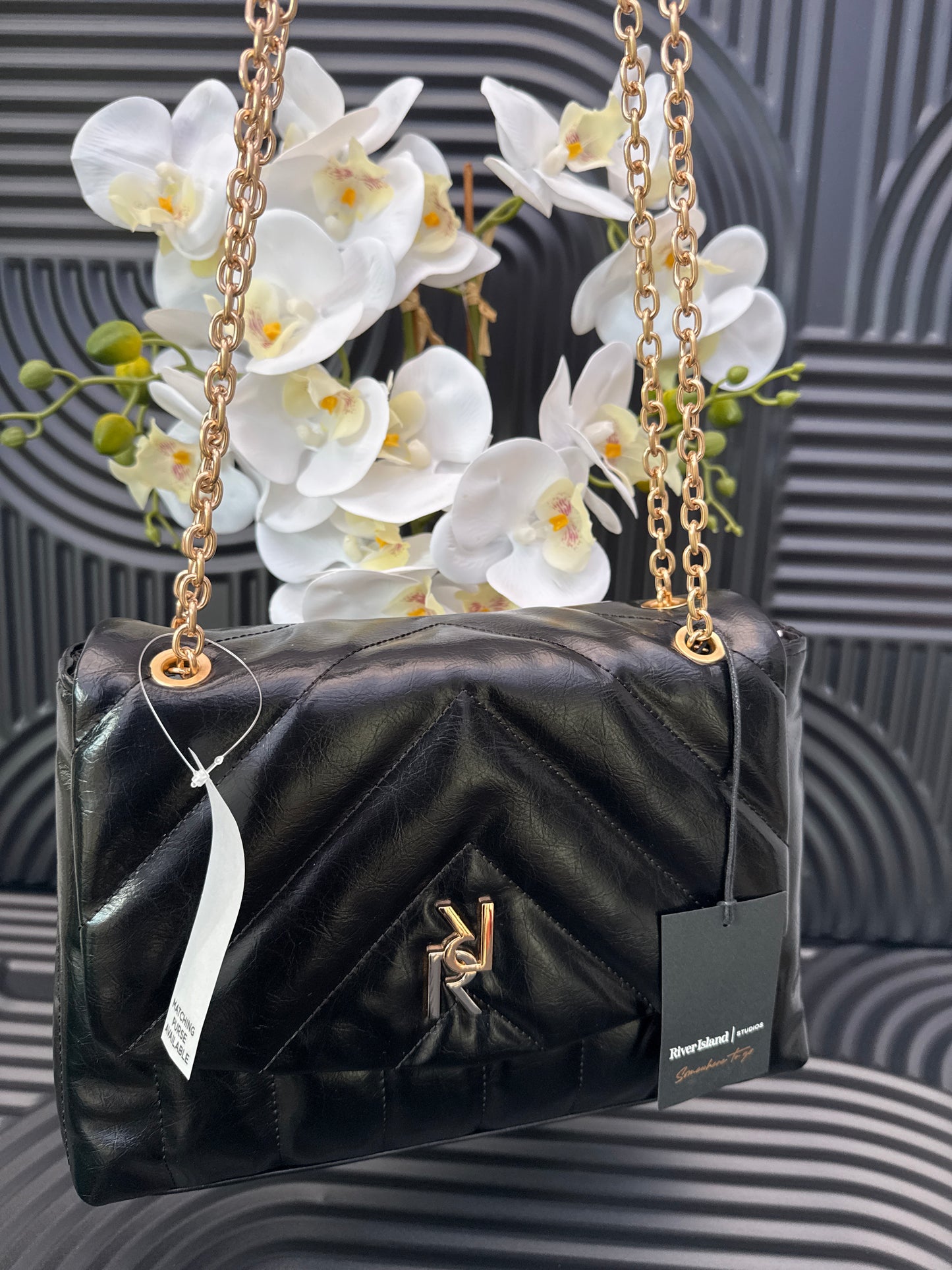 Black quilted chain strap shoulder bag