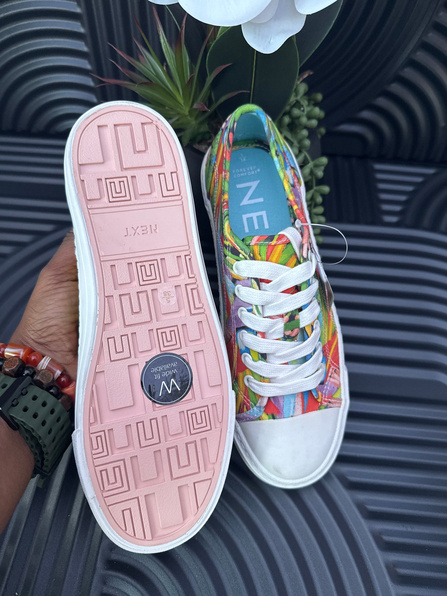 Floral detail lace up trainers