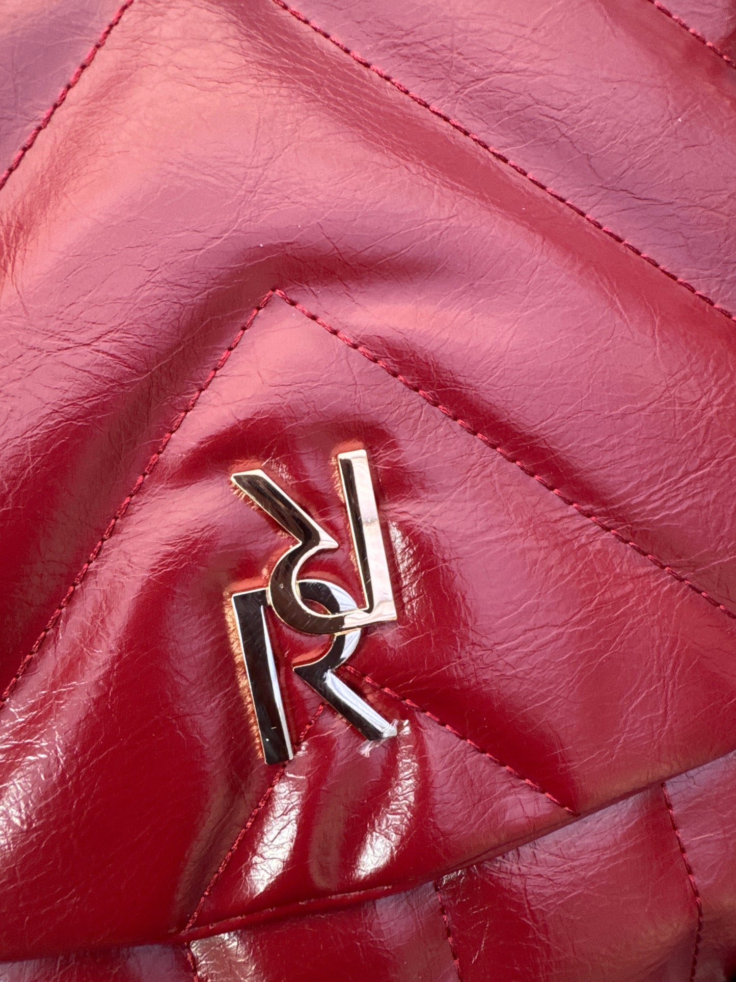 Red quilted chain strap shoulder bag
