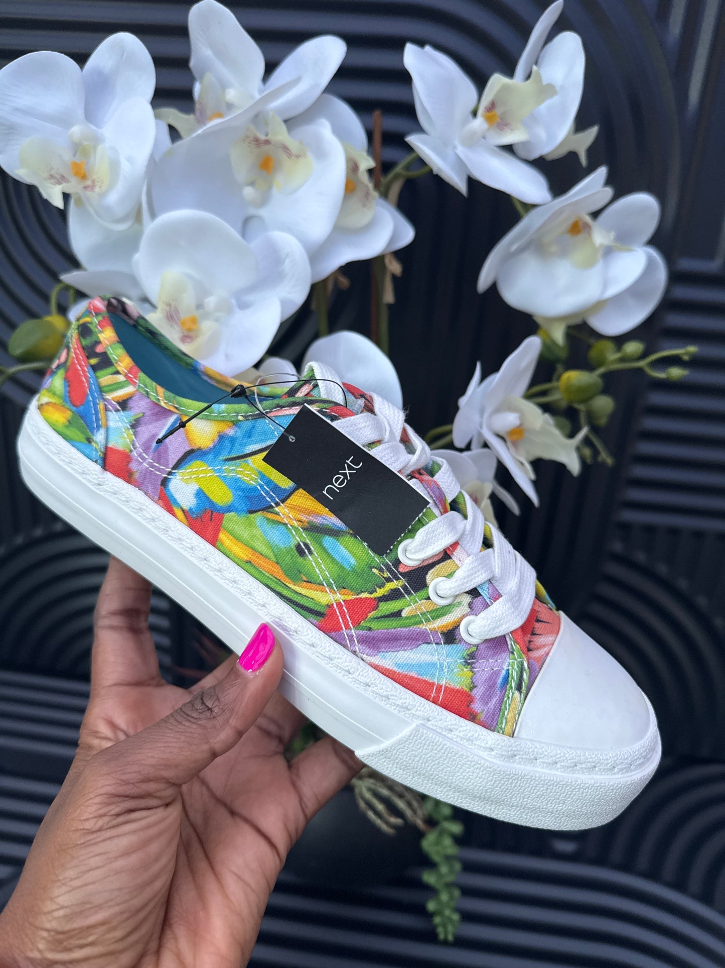 Floral detail lace up trainers