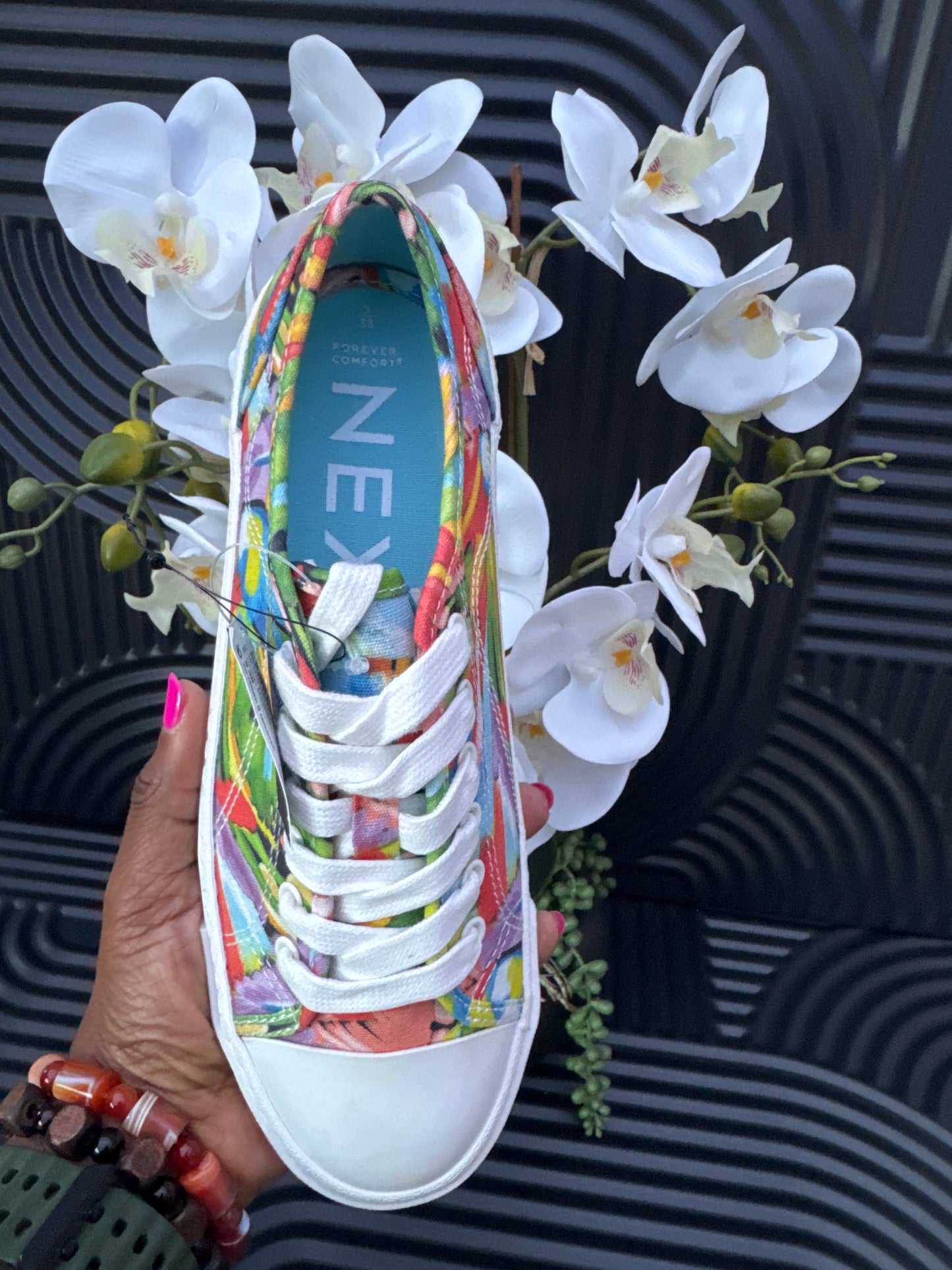 Floral detail lace up trainers