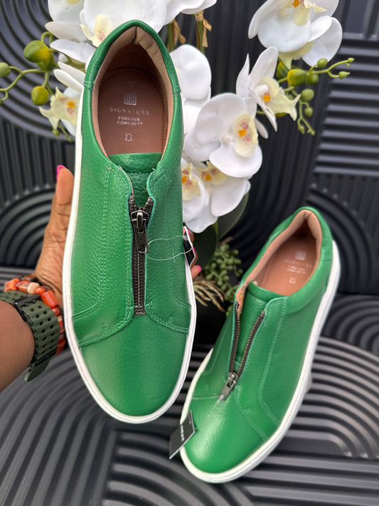 Green slip on sneakers zip detail