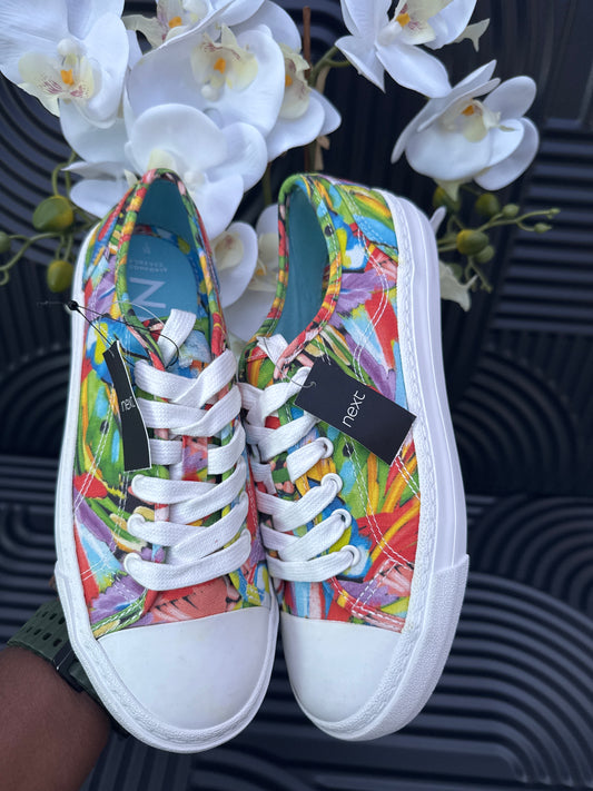 Floral detail lace up trainers