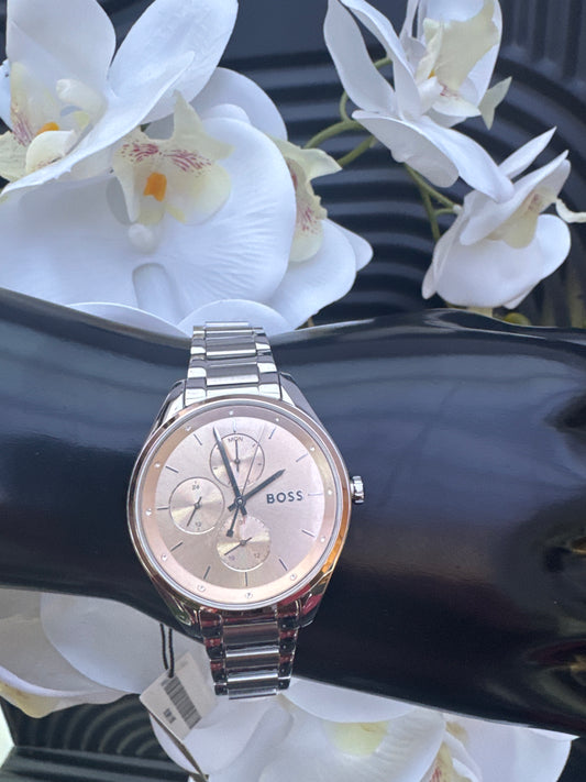 BOSS bracelet watch with rose gold dial.