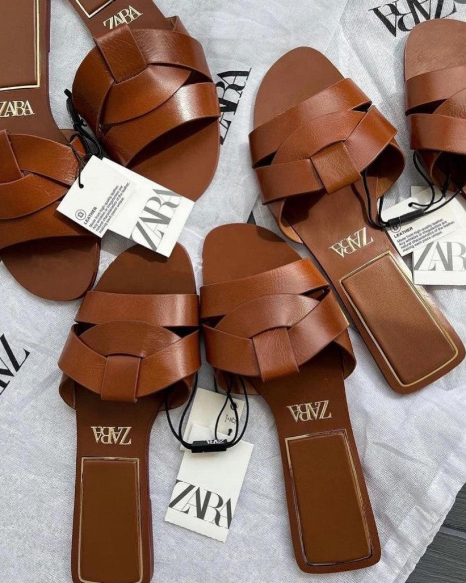 Flat criss-cross leather Sandal