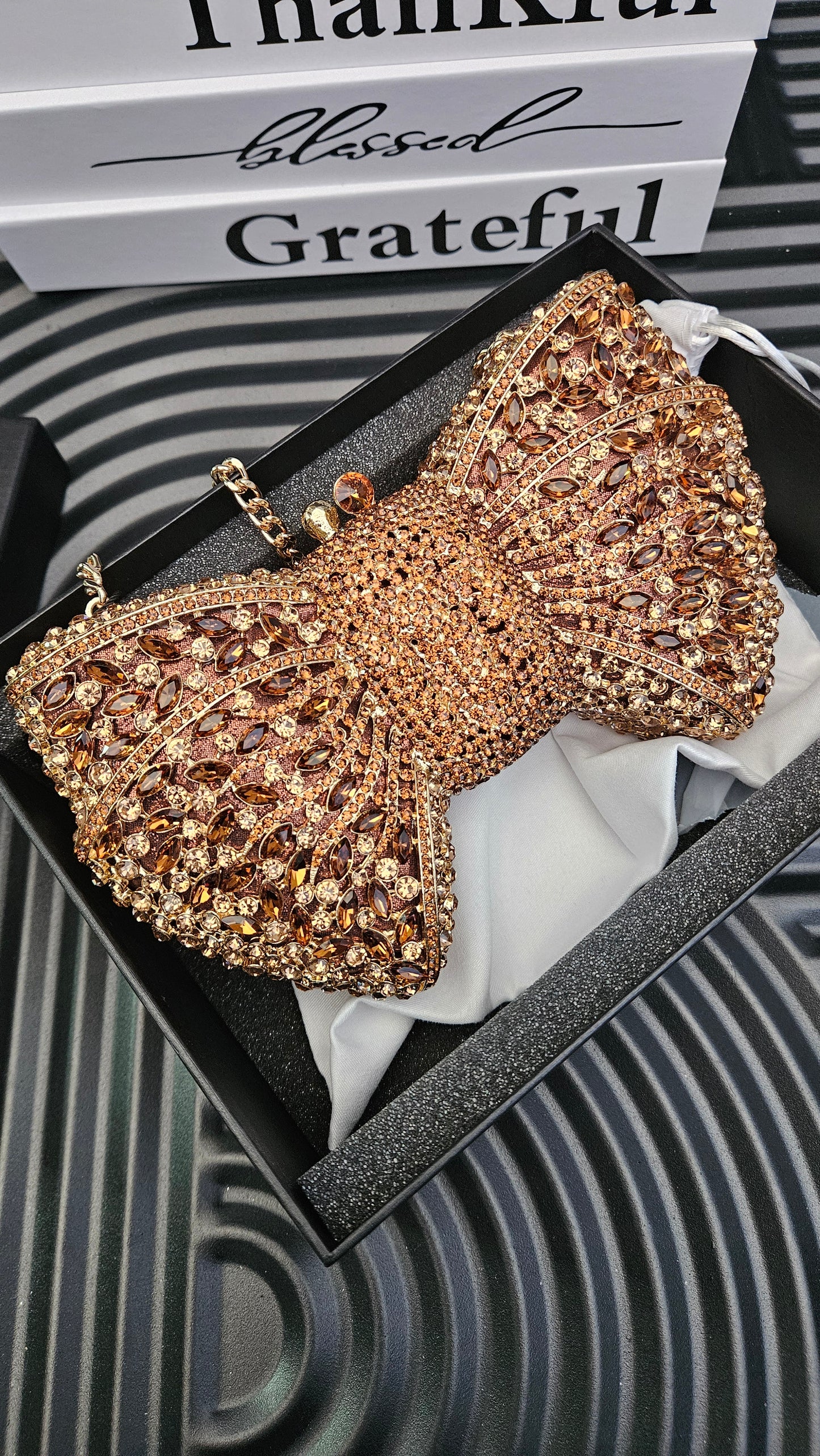 DUNE Bronze Bow Clutch Bag