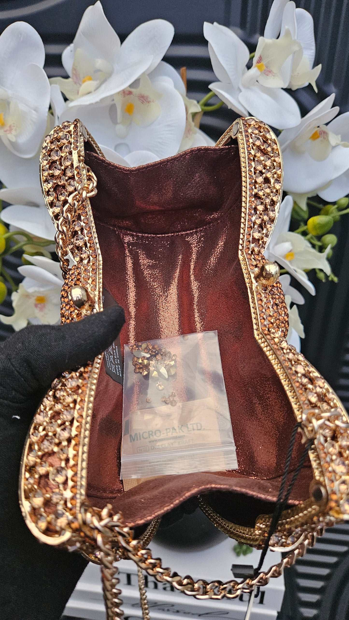 DUNE Bronze Bow Clutch Bag